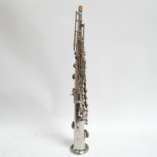 266 - A Soprillo saxophone made by La Lutherie Francaise of Paris, in what appears to be an associated har... 