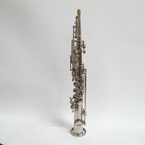 266 - A Soprillo saxophone made by La Lutherie Francaise of Paris, in what appears to be an associated har... 