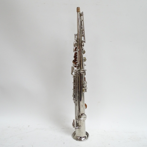 266 - A Soprillo saxophone made by La Lutherie Francaise of Paris, in what appears to be an associated har... 