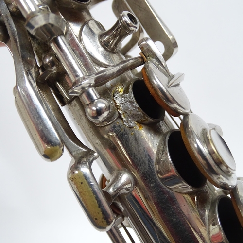 266 - A Soprillo saxophone made by La Lutherie Francaise of Paris, in what appears to be an associated har... 