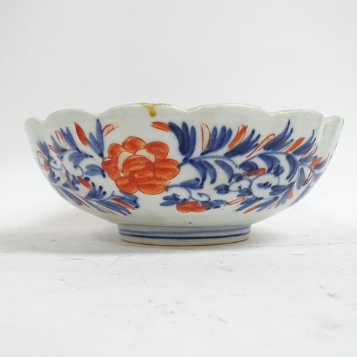 474 - A Chinese porcelain Antique bowl (A/F), with painted decoration, 26cm, and an Imari bowl