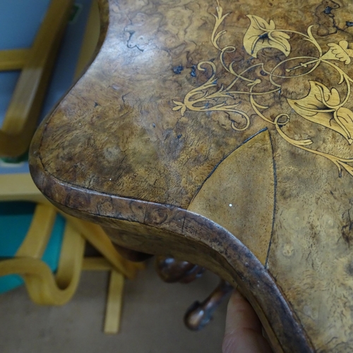 2109 - An antique walnut and burr walnut veneered workbox of shaped form, with satinwood inlay. Lifting lid... 