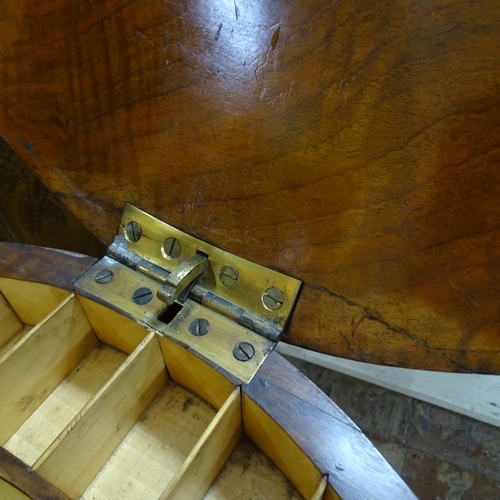 2109 - An antique walnut and burr walnut veneered workbox of shaped form, with satinwood inlay. Lifting lid... 