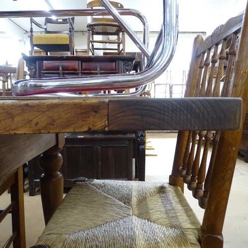 2167 - A large and impressive solid elm plank top farmhouse kitchen table with breadboard ends on turned le... 