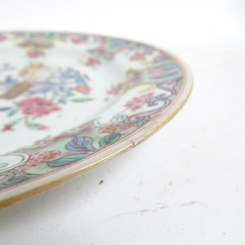 192 - A pair of famille rose Chinese plates, diameter 23cm