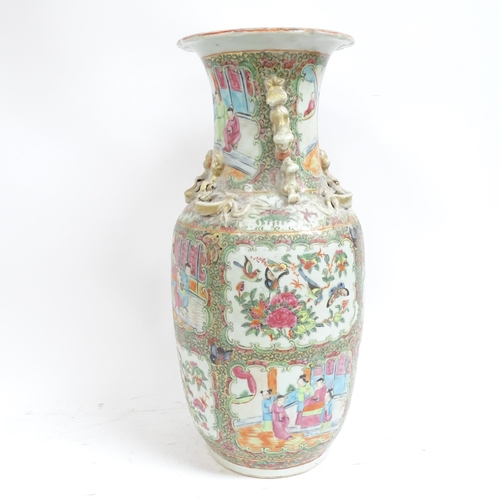 219 - A large Chinese Canton baluster vase, with applied decoration, H45cm