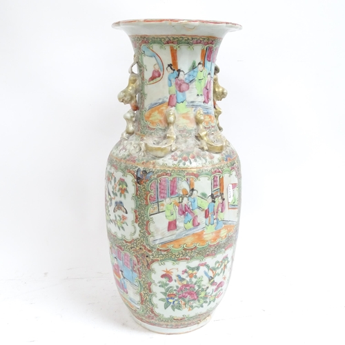 219 - A large Chinese Canton baluster vase, with applied decoration, H45cm