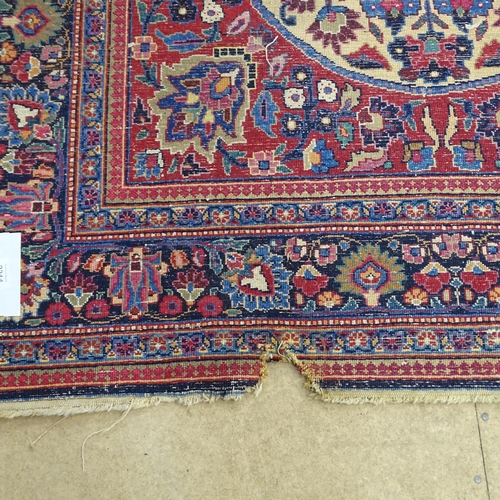 2311 - A blue and red-ground Persian prayer rug. 216x130cm