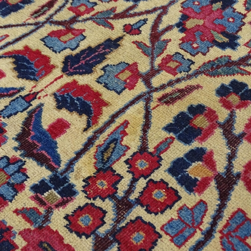 2311 - A blue and red-ground Persian prayer rug. 216x130cm