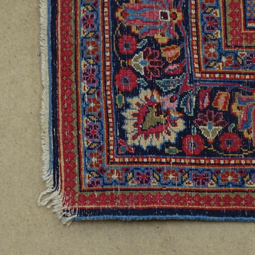 2313 - A blue and red ground Persian prayer rug. 220x130cm