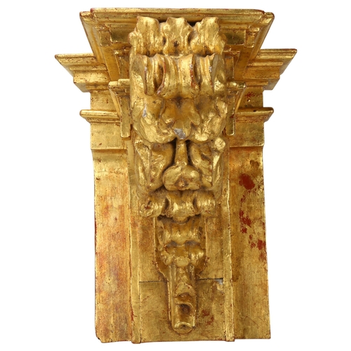 136 - An ornate carved giltwood wall bracket, probably early 20th century, height 46cm, width 38cm