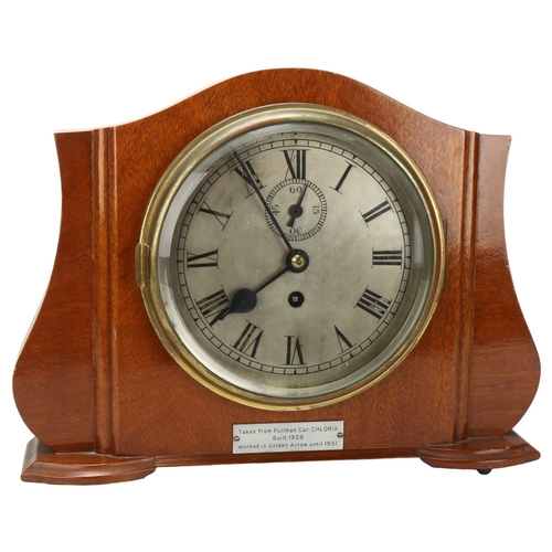 14 - RAILWAY INTEREST - a Pullman carriage style mantel clock, in shaped walnut case, with plaque 