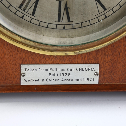 14 - RAILWAY INTEREST - a Pullman carriage style mantel clock, in shaped walnut case, with plaque 