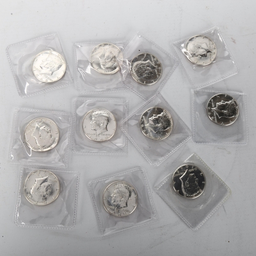 141 - 11 American silver half dollar coins, 126g total