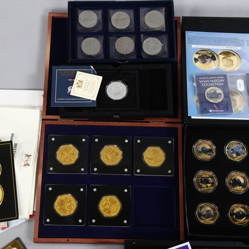 143 - A collection of modern commemorative coins