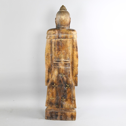 145 - A large floor standing carved and gilded wood Chinese standing Sage figure, height 119cm (3'11