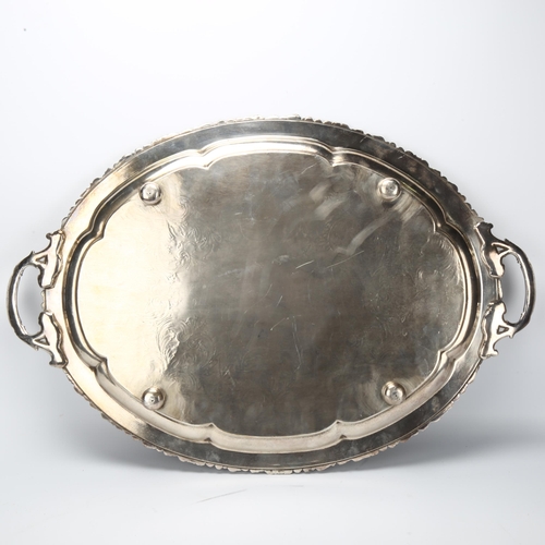 15 - Large 19th century electroplate tea tray with cast gallery, length including handles 69cm