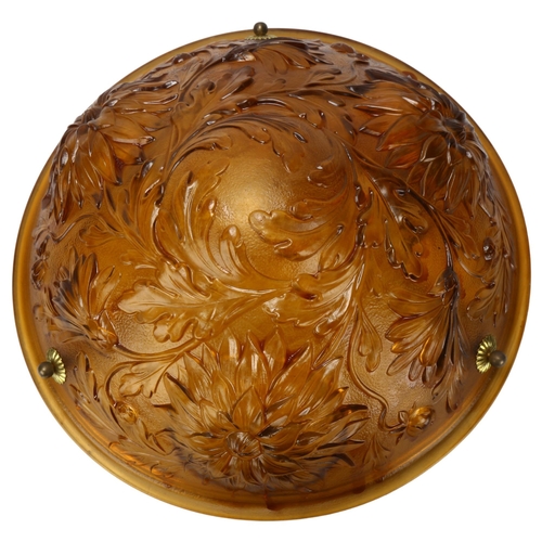 151 - A French amber glass plafonnier, relief moulded floral design, original buttons, new cords and wirin... 