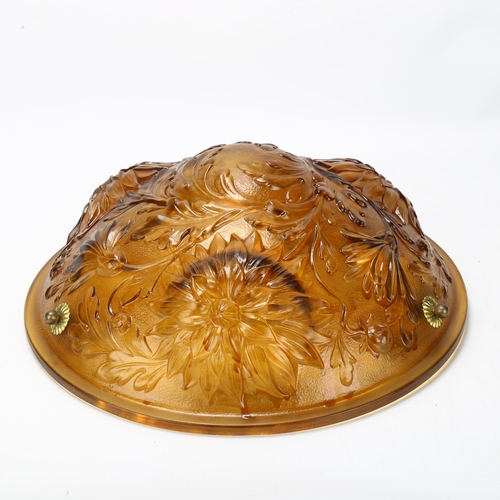 151 - A French amber glass plafonnier, relief moulded floral design, original buttons, new cords and wirin... 