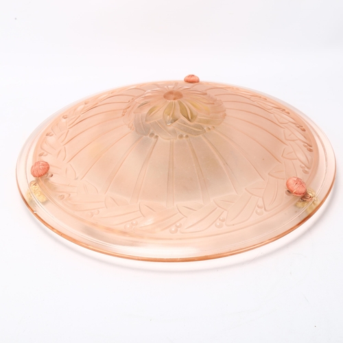 152 - A French pink glass plafonnier, relief moulded geometric design, new cords, diameter 35cm