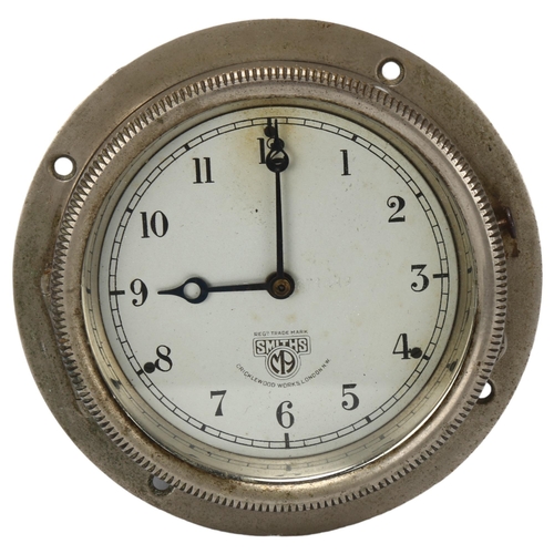 16 - MOTORING INTEREST - a Smiths car dashboard clock circa 1930, made at the Cricklewood Works London, w... 