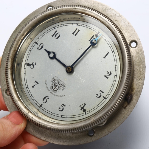 16 - MOTORING INTEREST - a Smiths car dashboard clock circa 1930, made at the Cricklewood Works London, w... 