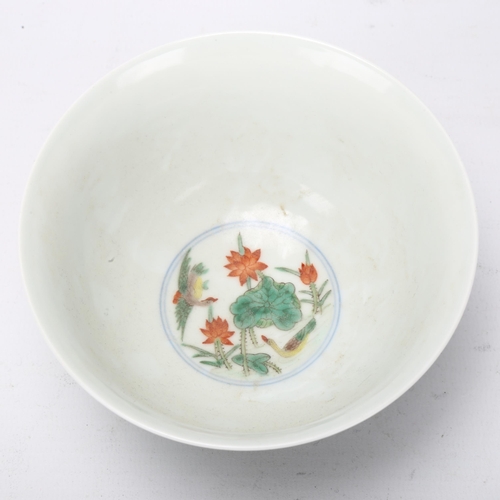 160 - A Chinese porcelain bowl with painted duck and lily flower designs, Qianlong seal mark under, diamet... 