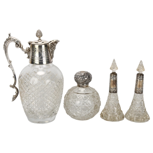 163 - 3 early 20th century cut-glass toilet jars with hallmarked silver tops, and a Victorian cut-glass Cl... 