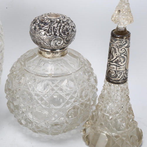 163 - 3 early 20th century cut-glass toilet jars with hallmarked silver tops, and a Victorian cut-glass Cl... 