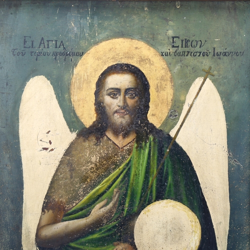 179 - A Greek painted wood religious icon, in original painted and lacquered frame, 53cm x 41cm