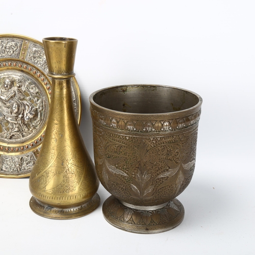 190 - A group of Islamic metalware, including a silver inlaid brass plate, diameter 20cm (5)