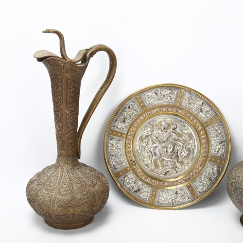 190 - A group of Islamic metalware, including a silver inlaid brass plate, diameter 20cm (5)