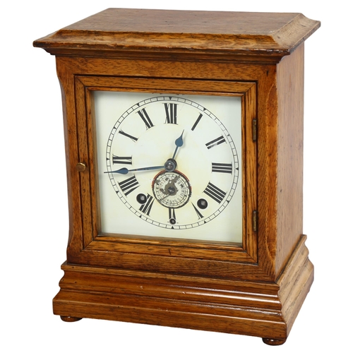 203 - A Victorian oak-cased 8-day office mantel clock, with alarm movement, case height 26cm