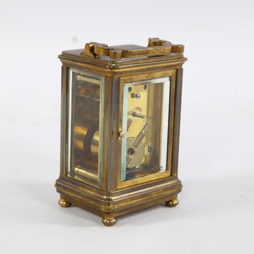 204 - A French brass-cased 8-day carriage clock, height 12cm