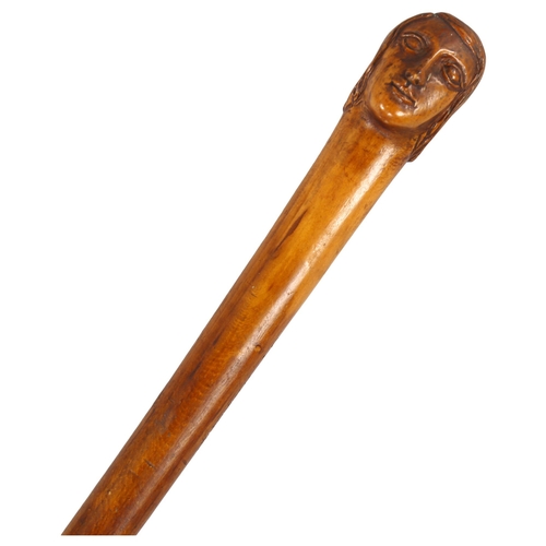 207 - An early 20th Century prisoner of war, possibly Boer War, carved walking cane engraved 