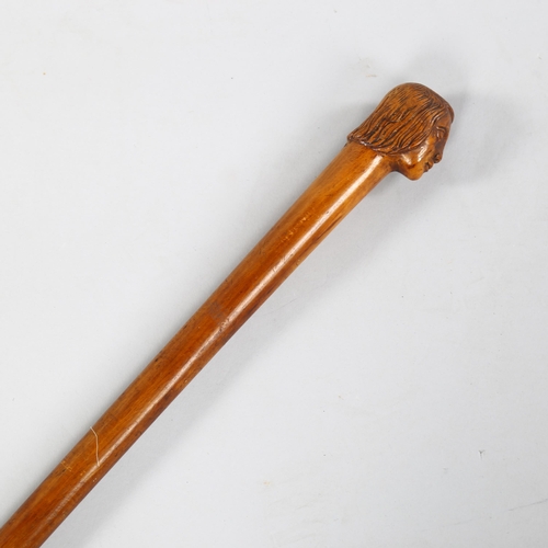 207 - An early 20th Century prisoner of war, possibly Boer War, carved walking cane engraved 