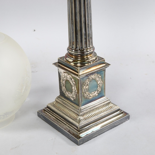 208 - A late 19th century silver plated Corinthian column oil lamp with cut-glass well, with later shade a... 