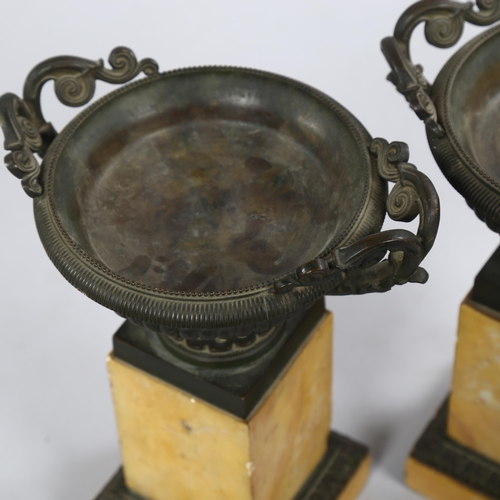 213 - A pair of 19th century bronze tazza urns on Sienna marble plinths, height 23.5cm