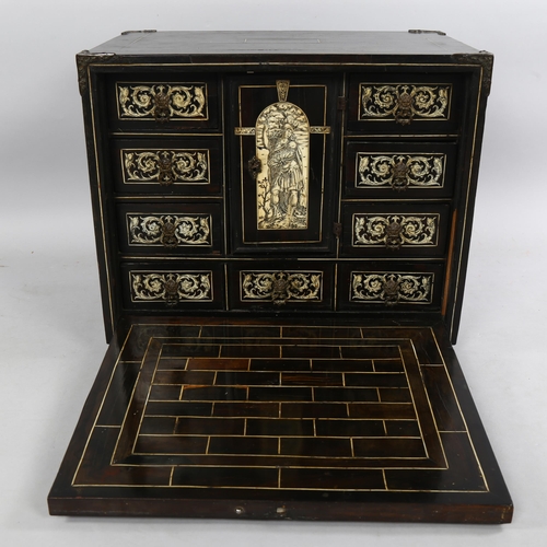 215 - An 18th century Italian ebonised table-top cabinet with ivory engraved panels of Classical form, wit... 