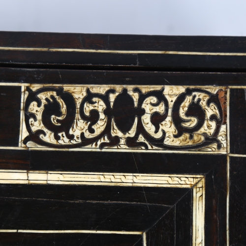 215 - An 18th century Italian ebonised table-top cabinet with ivory engraved panels of Classical form, wit... 