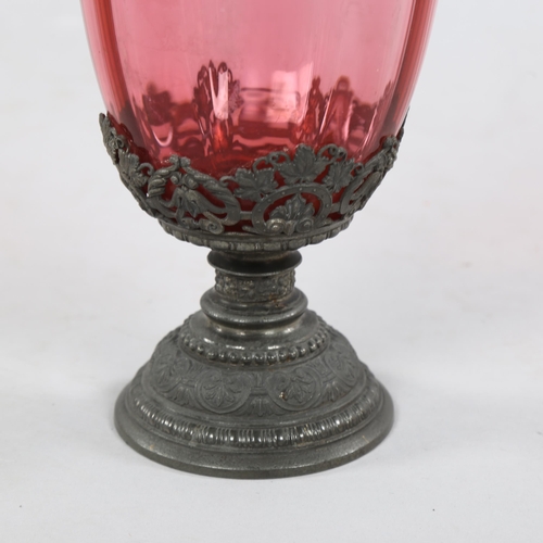 230 - A 19th century German cranberry glass jug with metal mounts, height 14cm