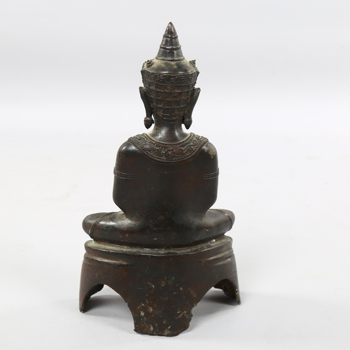 231 - A South East Asian bronze seated Buddha, height 30cm