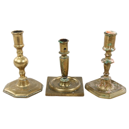 235 - A 17th/18th century Spanish bronze candlestick, together with 2 others, tallest 17cm