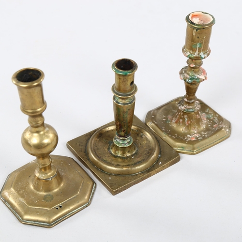 235 - A 17th/18th century Spanish bronze candlestick, together with 2 others, tallest 17cm