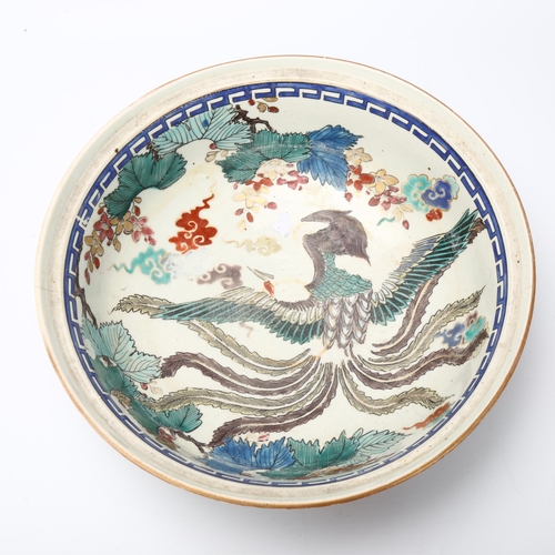 27 - Japanese Meiji Period porcelain bowl, hand painted phoenix decoration, and decorated panel surround,... 