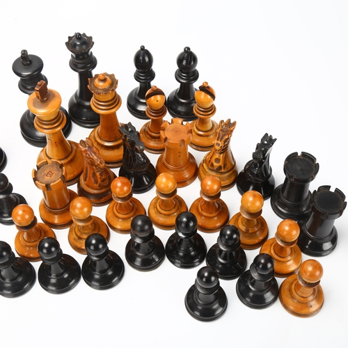 34 - 2 Staunton pattern chess sets, boxwood and ebonised, King height 9cm, full sets with some replacemen... 