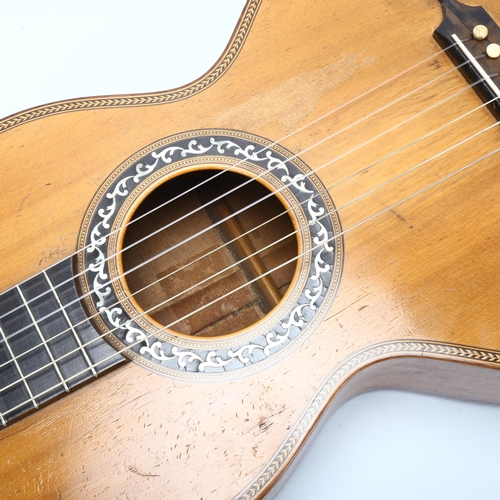 35 - A 19th century rosewood and satinwood acoustic guitar, with inlaid mother-of-pearl marquetry, body l... 