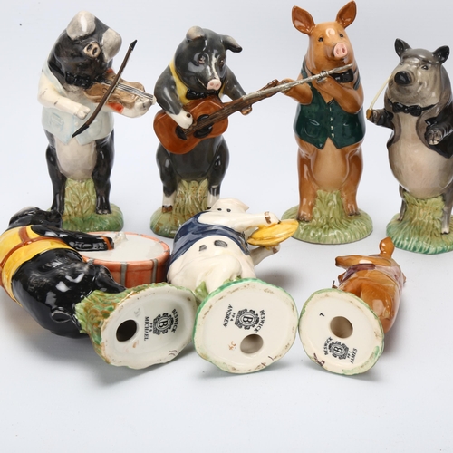 42 - BESWICK - 9-piece pig band, largest height 13cm