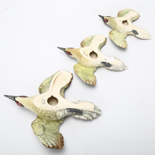 53 - Graduated set of 3 Beswick green woodpecker wall ornaments, pattern no. 1344, largest length 19cm