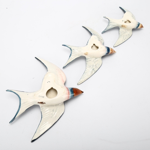 54 - Graduated set of 3 Beswick swallow wall ornaments, pattern no. 757, largest length 16cm